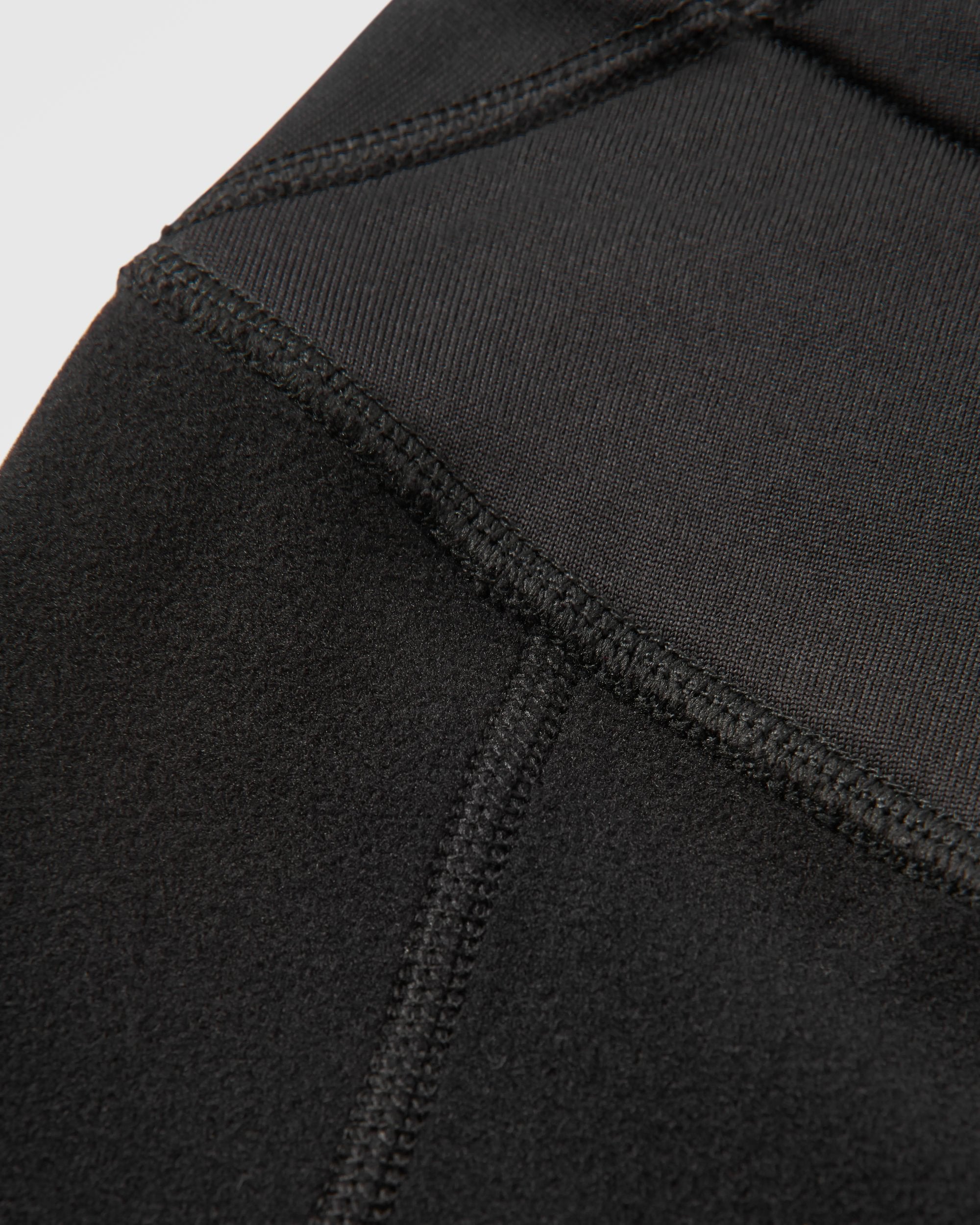 Solitude Recycled Polartec® Legging - Black - Flatlay