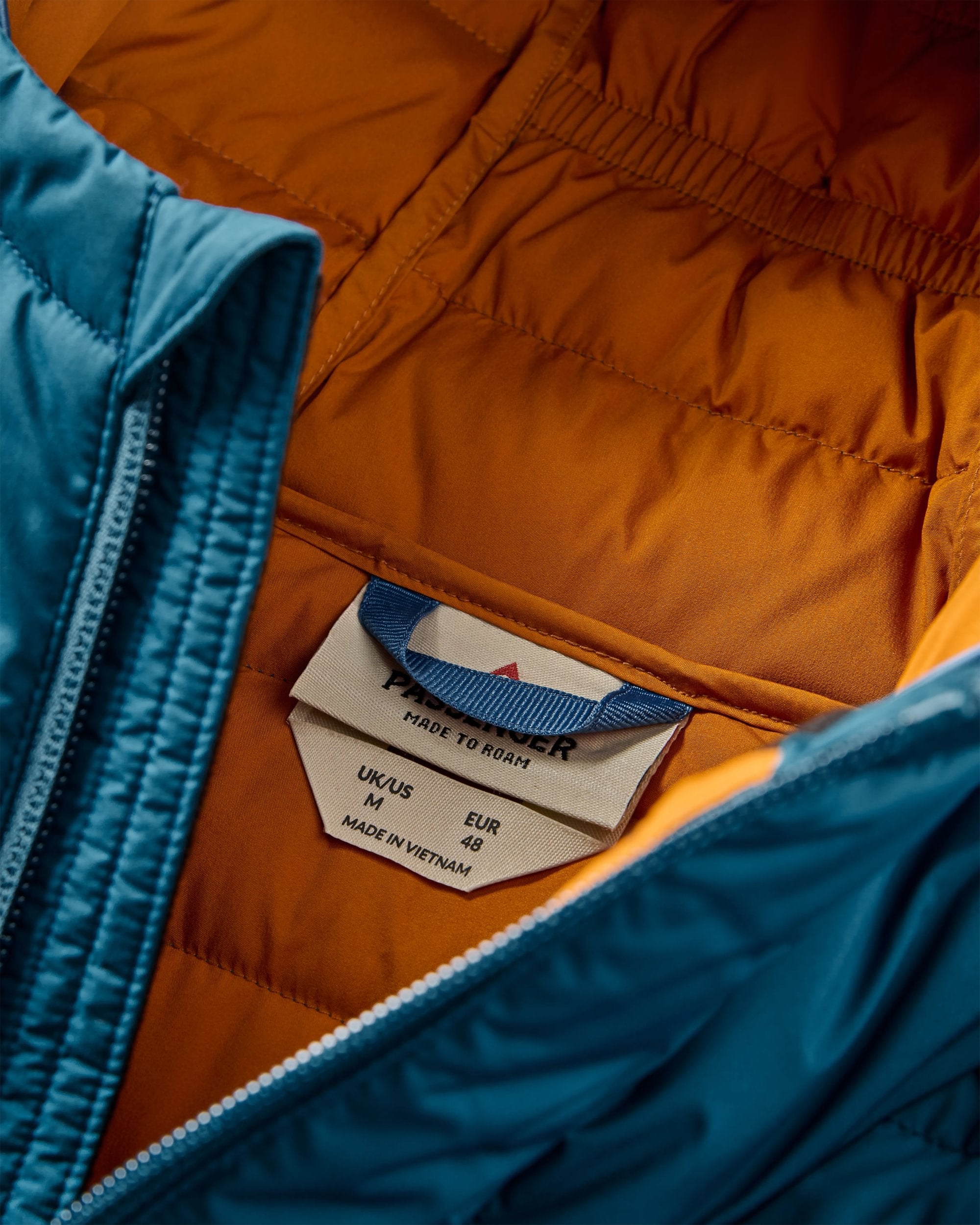 Ashland Down Recycled Jacket - Retro Orange/Tidal Blue - Flatlay