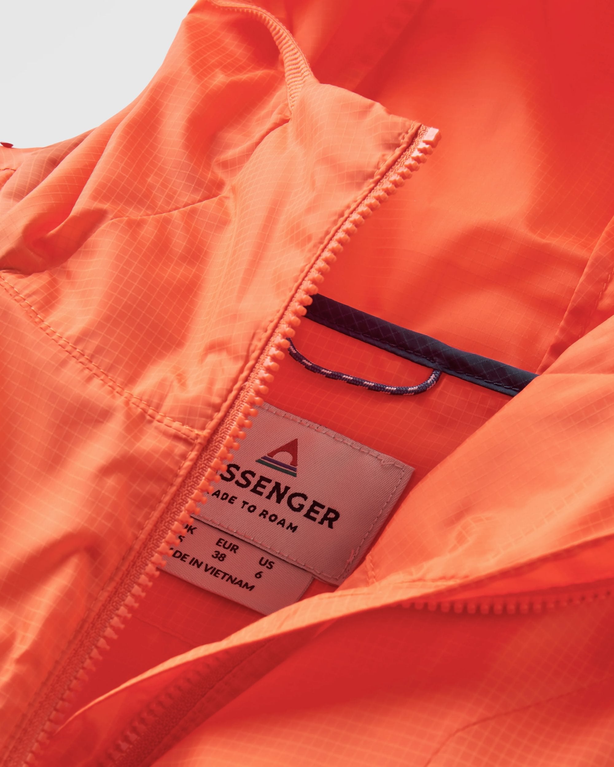 Viento Recycled Windshell Anorak - Ember Orange - Flatlay