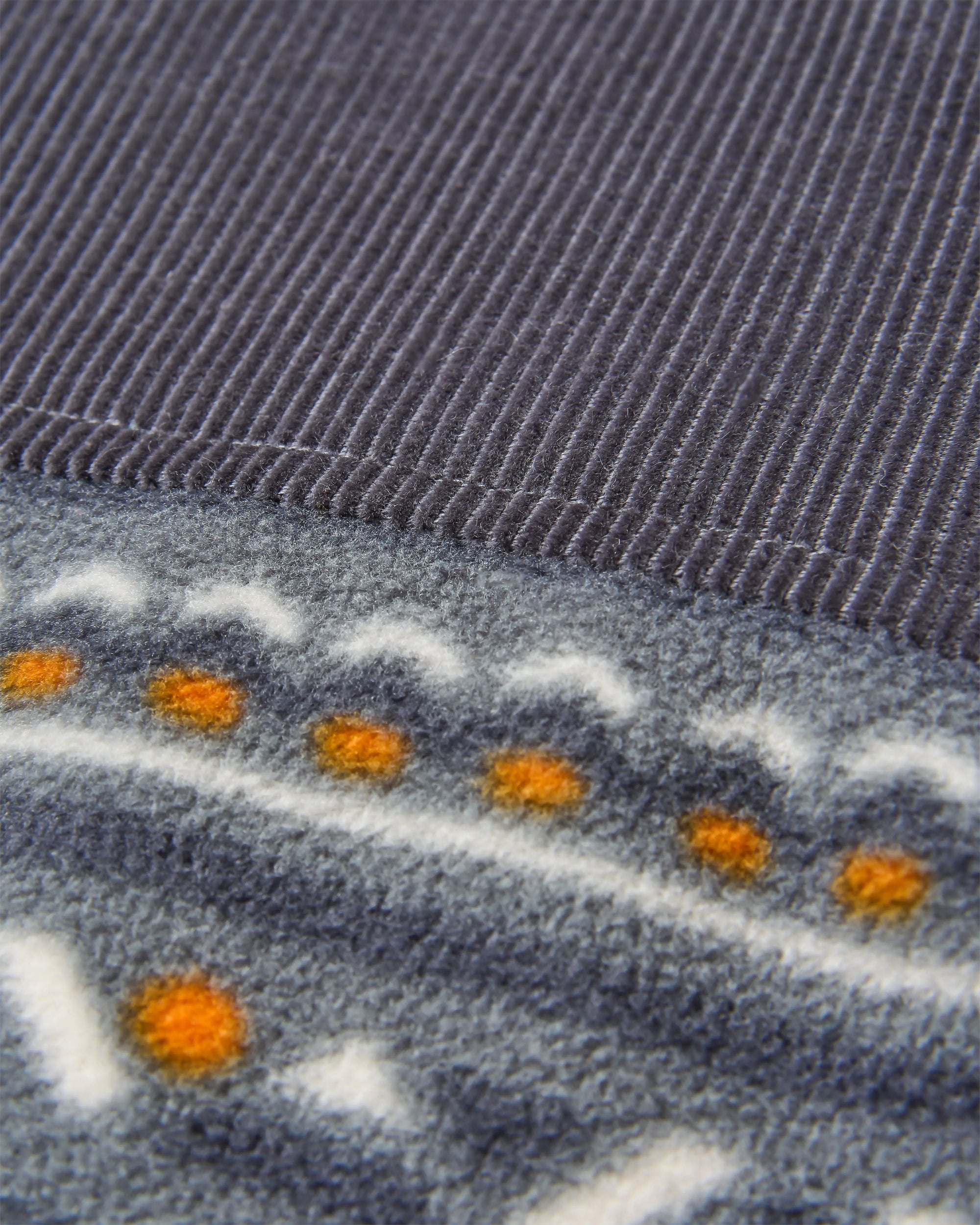 Somewhere Recycled Fleece - Geo Tracks Charcoal - Flatlay