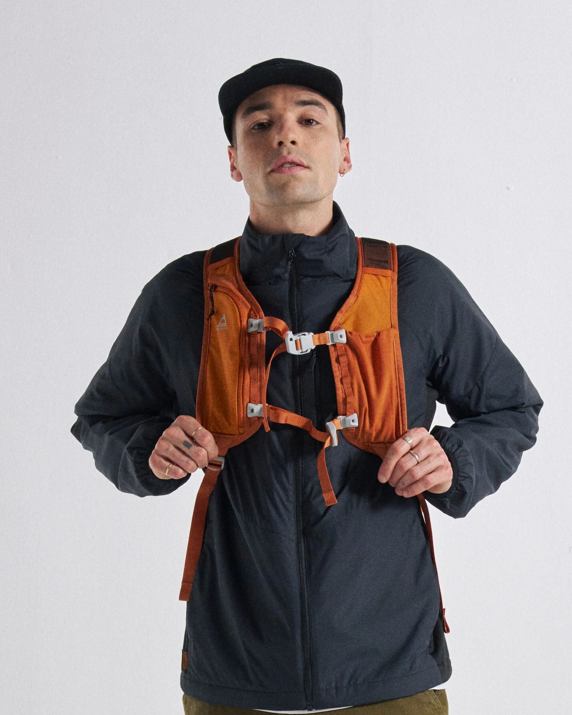 Trailscape Recycled 18L Backpack - Sunrise Orange - Studio Model - Male