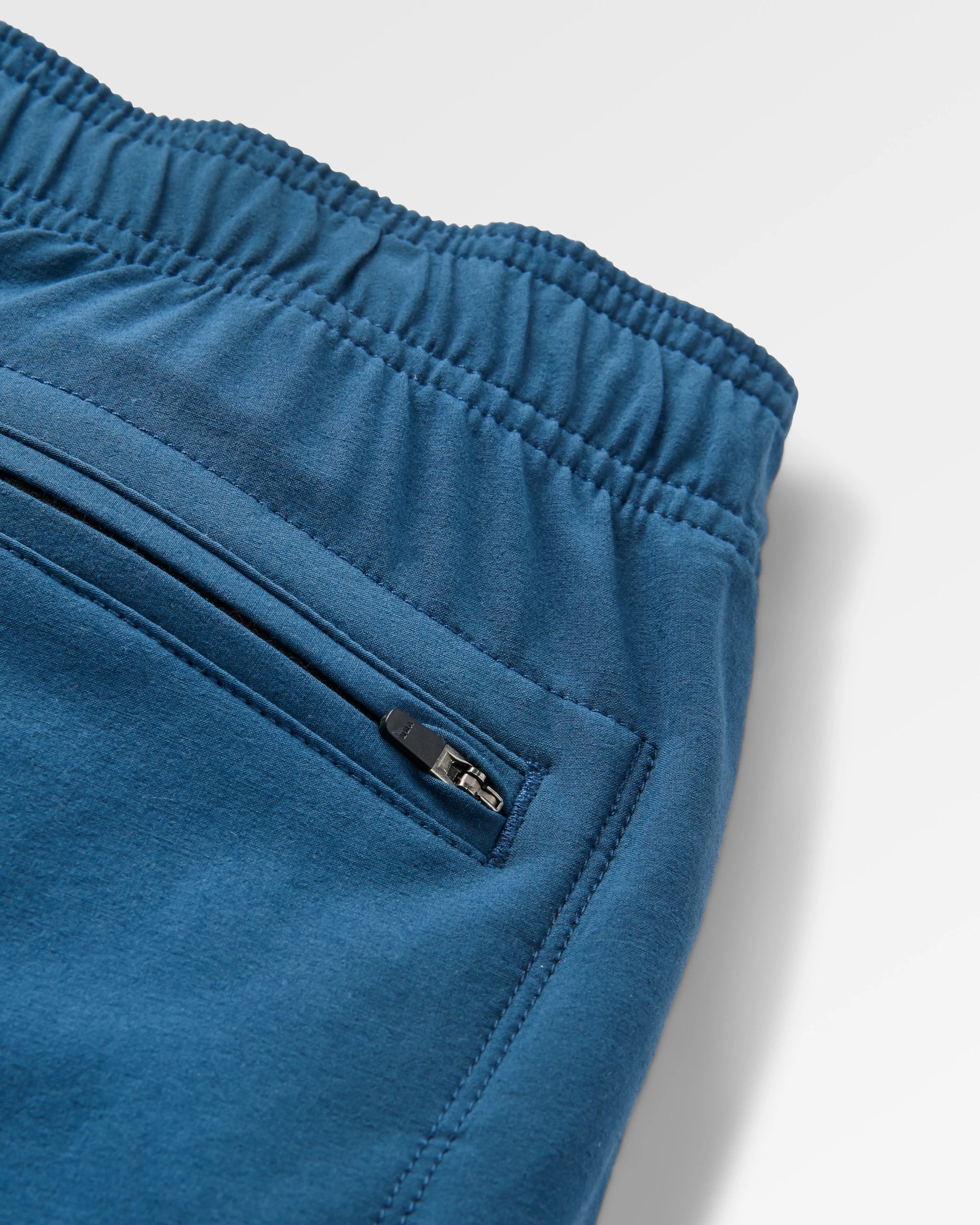 Traveller Organic All Purpose Short 2.0 - Dark Denim - Flatlay